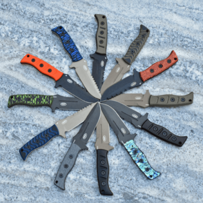 A circle of knives in the snow with different colors.