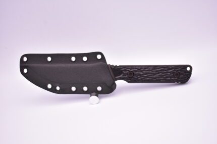 A black knife with a leather sheath on it.