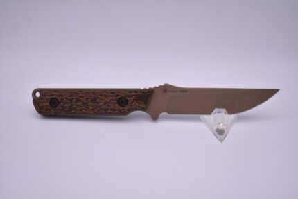 A knife with a wooden handle and brown handles.