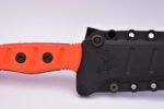 A knife that is orange and black