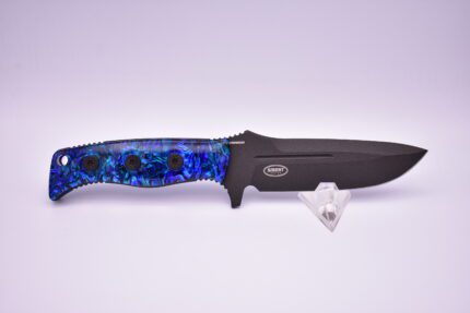 A knife with blue and black handle on top of a white surface.