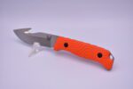 A knife with an orange handle and black tip.